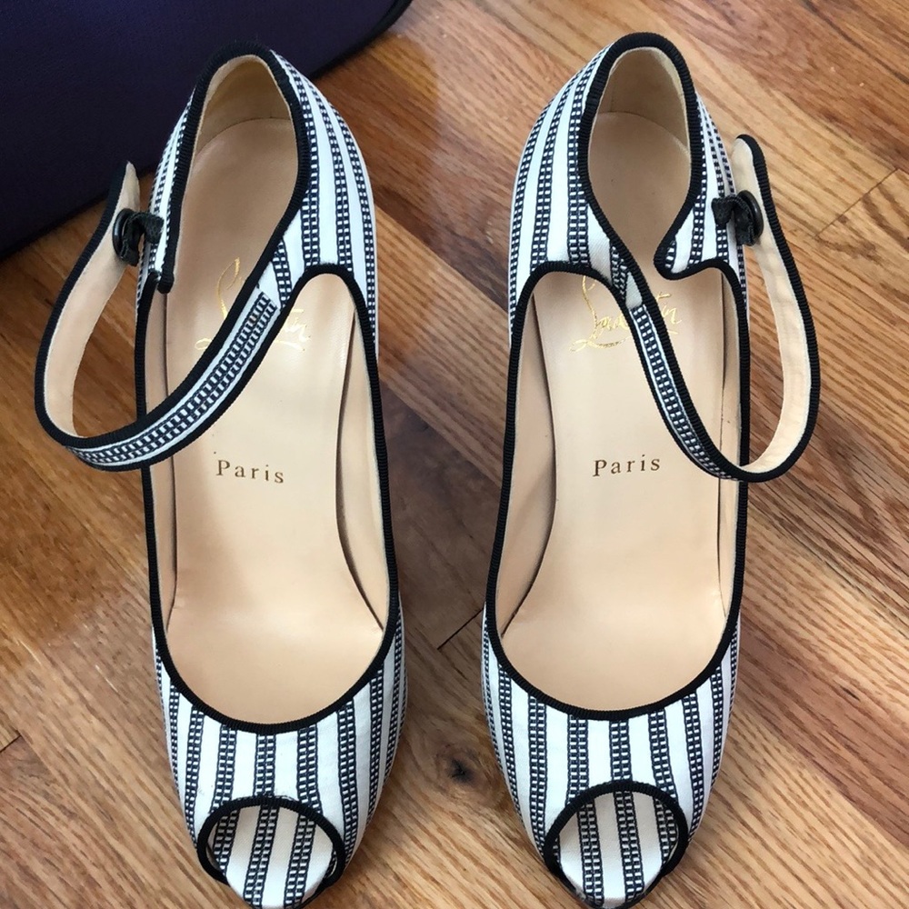 Navy and black Christian Louboutin peep toed shoe